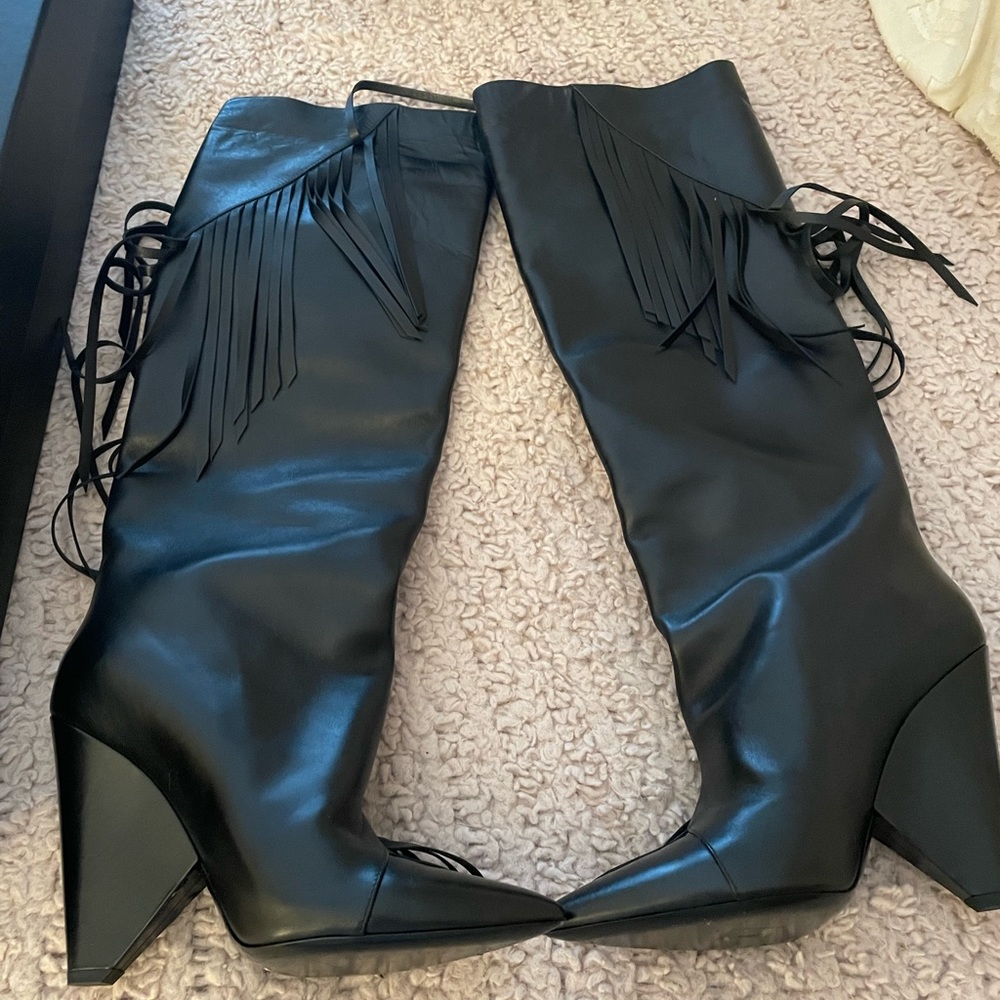 Saint Laurent Niki 105 Fringe, knee high leather boots.